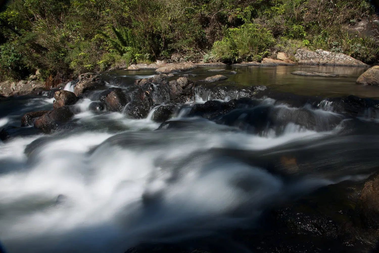 Sri Lanka hill-country waterfall and mountain scenery